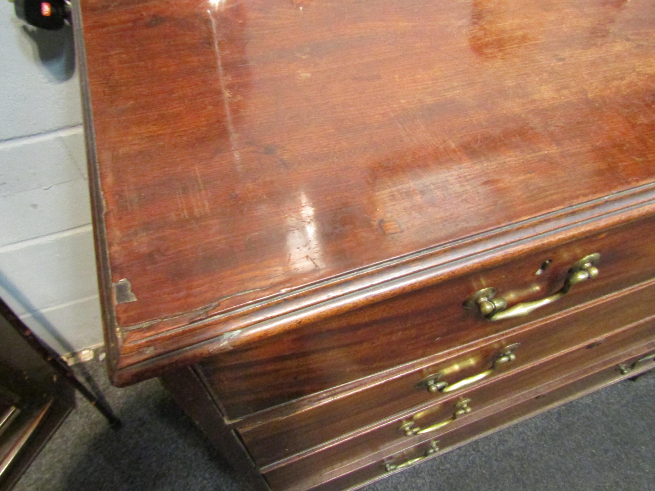 A George III mahogany chest of two short over three long drawers, brass swan neck handles, on - Image 2 of 4