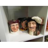 Three large character jugs by Royal Doulton including "Pied Piper & Athos"
