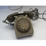A two tone grey dial telephone
