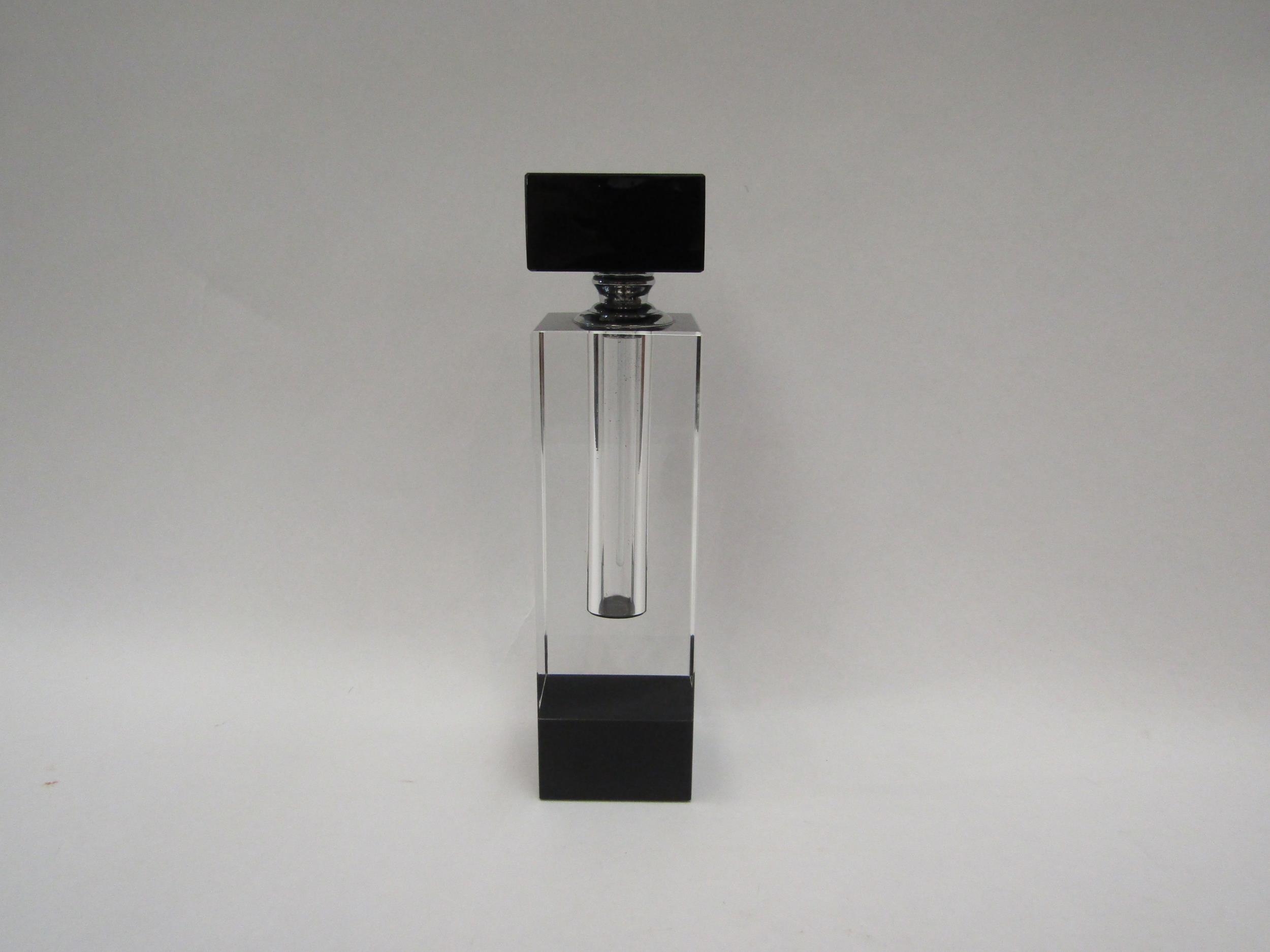 A modern glass scent bottle of square form in clear and black Art Deco style, 19cm high
