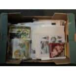A box containing assorted ephemera including sewing, music, fashion etc