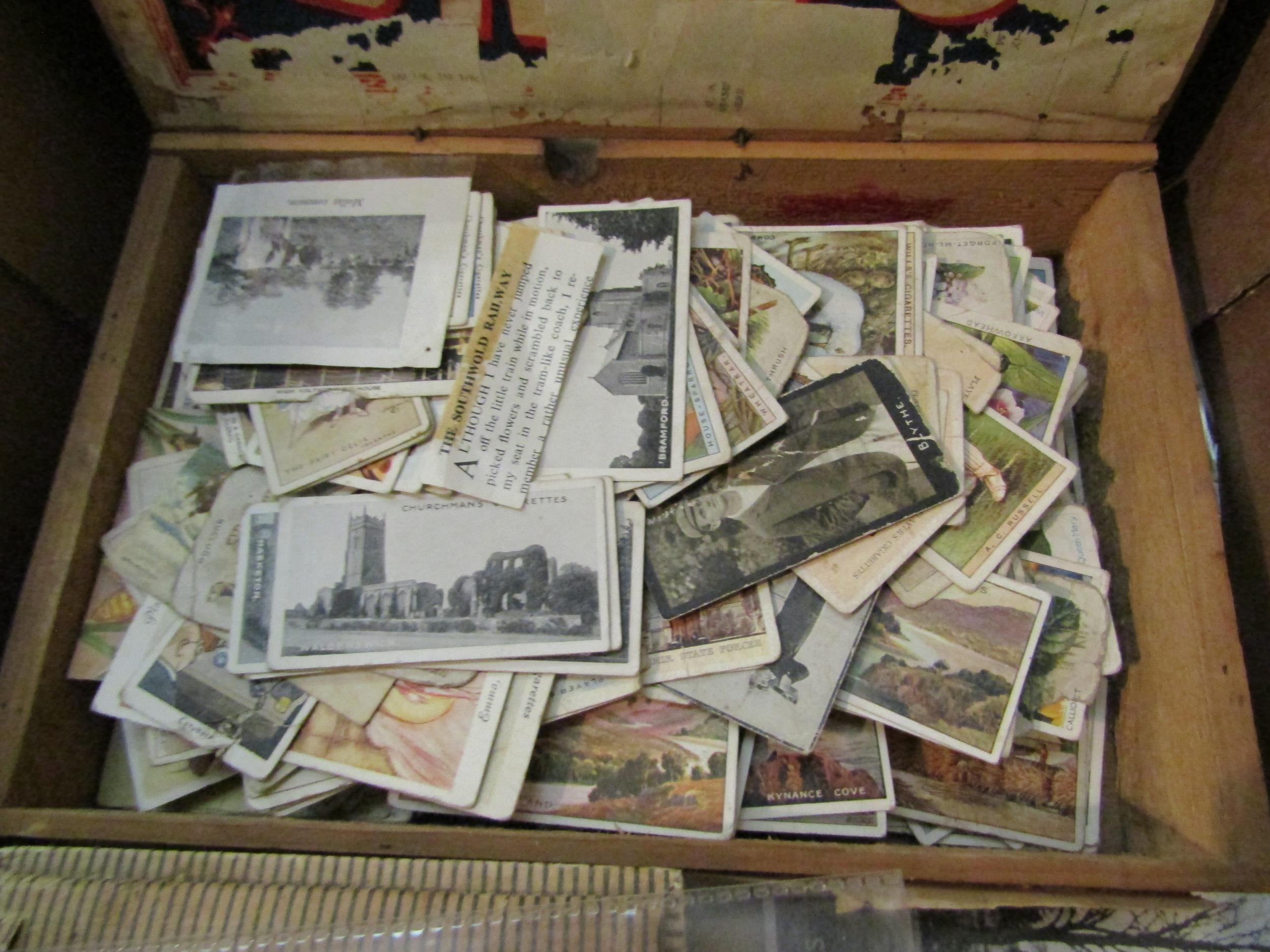 Two boxes containing two postcard albums, one containing mainly Continental examples, the other - Image 3 of 5