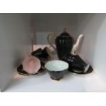 A Royal Standard tea set, cups decorated in a range of pastel colours internally, black to exterior
