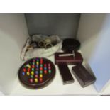 A bakelite solitaire game together with other bakelite items