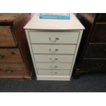 A chest of five long drawers, 77cm high x 51cm wide x 50cm deep