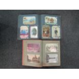 Four postcard albums containing over 400 early 20th Century cards and later, topographical UK,