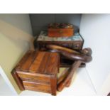A 1930's tea caddy with original liner, three other treen items and three vintage shoe stretchers