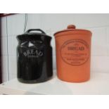 A Henry Watson pottery bread crock, together with a black ceramic bread crock