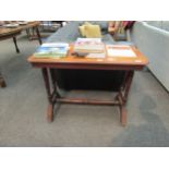 A late Victorian walnut side table, the canted corner top over ring-turned supports to spindle