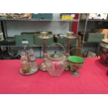 Silver plated items including a pair of weighted candlestick, cruet stand, etc