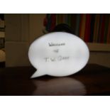 A light-up message box in the form of a speech bubble