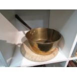 A heavy brass saucepan with copper rivets 23cm in diameter and a bread board (a/f)
