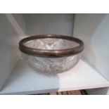 A silver banded Bohemian style cut glass fruit bowl