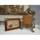 Two French photograph frames, one in burr walnut and the other metal of Art Nouveau form