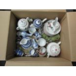 A quantity of ceramics including a Japanese tea set, blue and white, small Sylvac vases and Pallissy