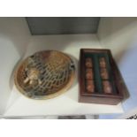A boxed set of 1930's copper plated napkin rings depicting deer and a Wade tortoise ashtray