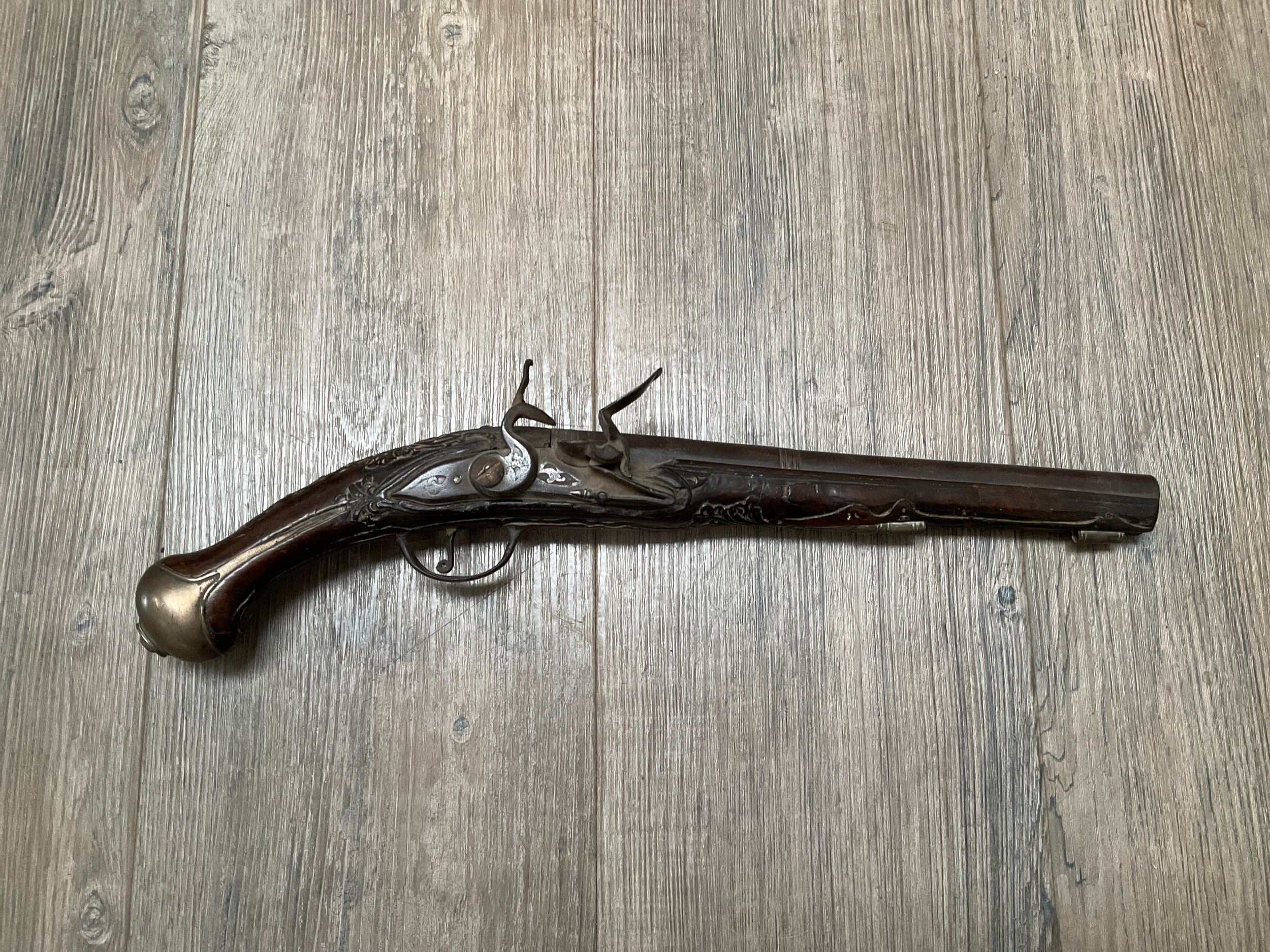 A late 18th Century flintlock pistol with all over scrolled foliate carving, part of mechanism - Image 2 of 6