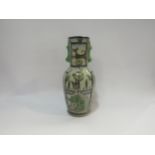 A Persian vase, 18th Century style decorated with Royal figures, animals and foilage, a/f chip to