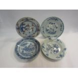 Four Oriental plates, some damage, 22.5cm diameter