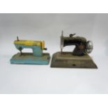Two childs sewing machines