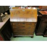 A walnut bureau, four drawer base, fitted interior, slide drawer sides, swan neck handles, bracket