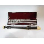 A white metal Jupiter flute K.H.S Musical Instrument, cased and allos students recorder