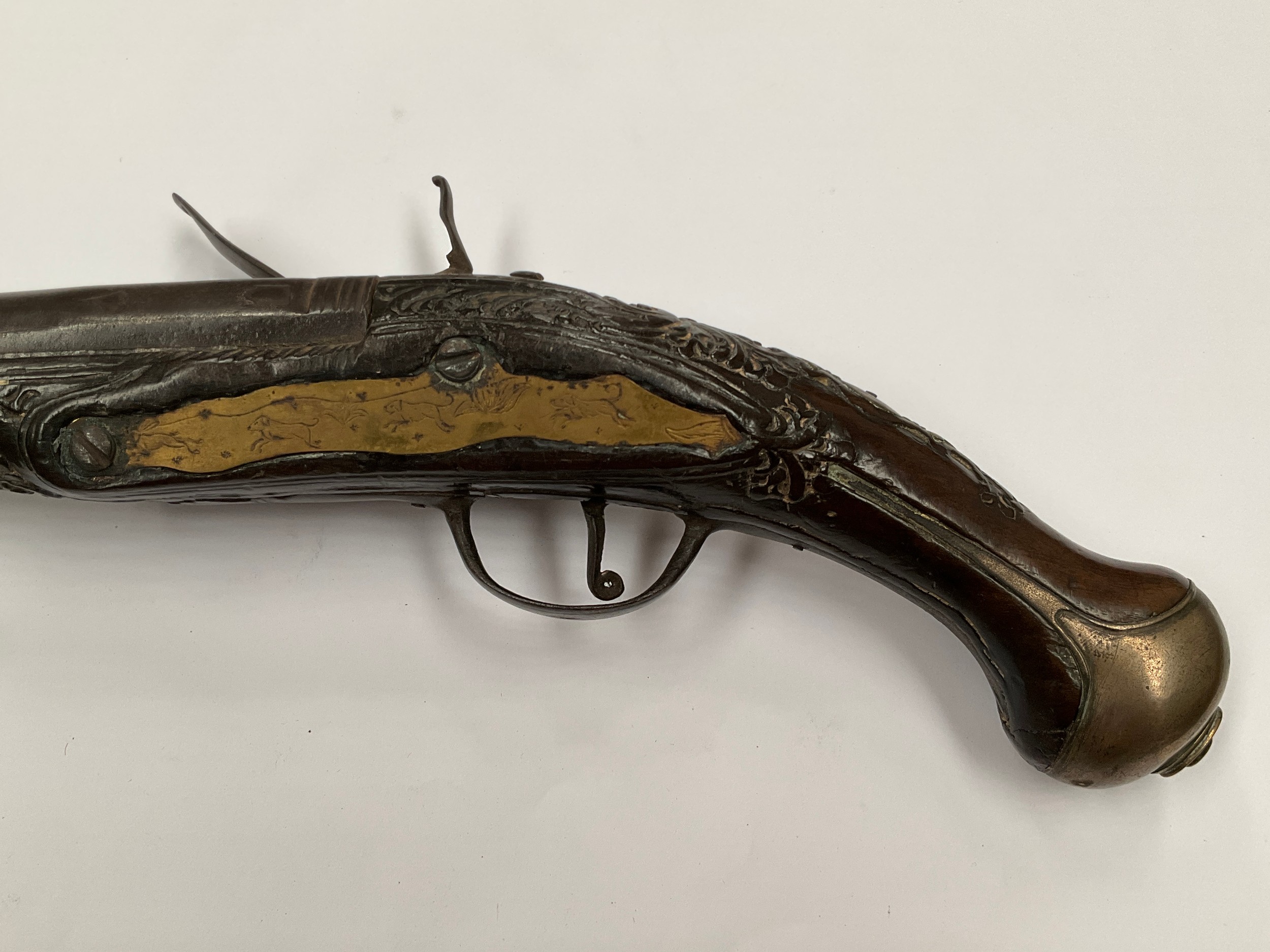 A late 18th Century flintlock pistol with all over scrolled foliate carving, part of mechanism - Image 5 of 6