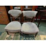 Two Edwardian bedroom chairs on ceramic castors