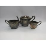 A Victorian three piece silver plate tea set, circa 1890, teapot missing knop