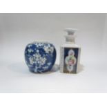 A Chinese blue ginger jar, prunus design, no lid and a Continental ceramic scent bottle, cobalt blue