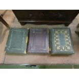 Three leather bound Victorian photograph albums, some with contents to include royalty
