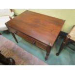 A 19th Century mahogany lamp table with metal stud corner decoration over a single frieze drawer