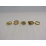 Five gold rings including two 9ct, two 18ct and one 22ct gold