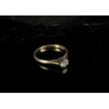 An 18ct gold diamond solitaire, 0.25ct approx. Size M/N, 1.9g