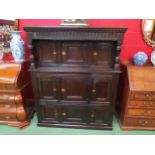 A Circa 1700 English pegged oak court cupboard with unusual bank of nine cupboard panelled doors