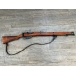 A non-firing re-enactment replica .303 Lee Enfield SMLE Rifle made by Denix, full size with a