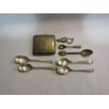 A silver cigarette case, silver bracelet and various silver/ plated teaspoons
