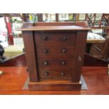 A 19th Century mahogany four drawer table-top collectors chest. 39cm high x 32cm wide x 23cm deep