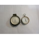A brass cased pocket aneroid barometer, with altitude ring, by Callaghan & Co, London 6.5cm