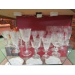 A collection of cut glass sherry glasses, brandy glasses, to include a set of six Stuart Crystal (