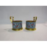 A pair of Podstakanniks gilt and enamel USSR teaglass holders