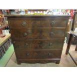 A 19th Century flame mahogany faux drawer cabinet, the single door over bracket feet with key,