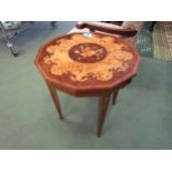 An Italian style coffee table with scrolled marquetry lift-up top, 51cm high