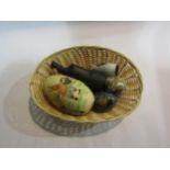 A basket containing miscellaneous including a bygone Russian doll painted with rabbits, Cloisonne