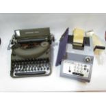 An Olivetti adding machine and a vintage typewriter (2)