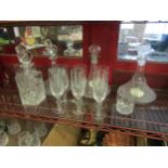 Two crystal whisky decanters, three ships decanters, six champagne flutes etc