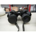 Two pairs of binoculars including Carl Zeiss Jenoptem 10x50w, both cased