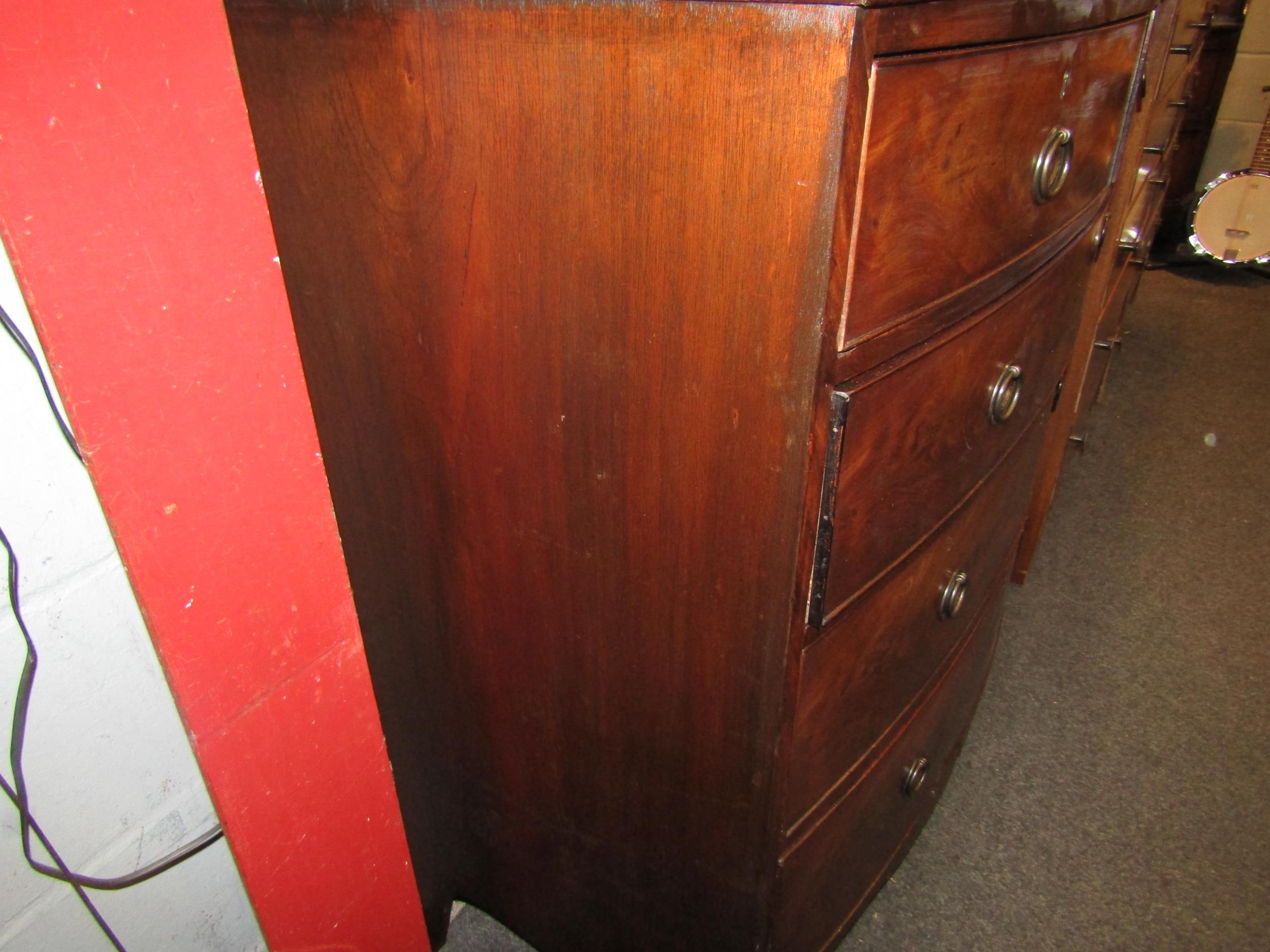 A George III flame mahogany bow front chest of two short over three graduating long drawers with oak - Image 4 of 4
