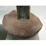 A part set of six graduated hand bells, stamped R J Ward & Sons, Liverpool, some damage, for