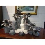 A Tessa Fuchs studio pottery sculpture of a rocky landscape with trees and waterfall, 47cm high, a/f